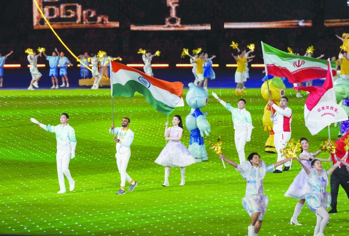 Flag Bearer Pr Sreejesh Leads The Indian Contingent During The Closing