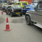 The dilapidated condition of the highway near Garikhana (ST).