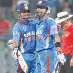 Virat Kohli greets Suresh Raina after Suresh completed his half century