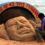 sand sculpture of  Gaddafi