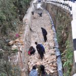 Men at work busy constructing drains at Polo to prevent floods that annually hit the area  due to overflowing of the Umkhrah River during monsoon season on Thursday (TM)