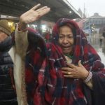 A Pakistani woman sees off her relatives travel to India via Samjhota Express