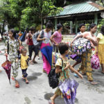 Ethnic Rakhine villagers arrive