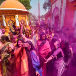 Devotees celebrate Holi