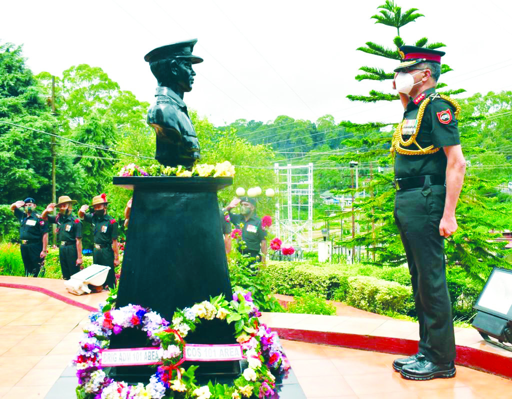 The General Officer Commanding Of 101 Area Salutes After Laying A 