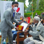 WGH, DC Ram Singh presenting the Citation to Albinstone M Sangma, the surviving member who took active part in the struggle for Statehood at DC Park Tura on 21.1.2022