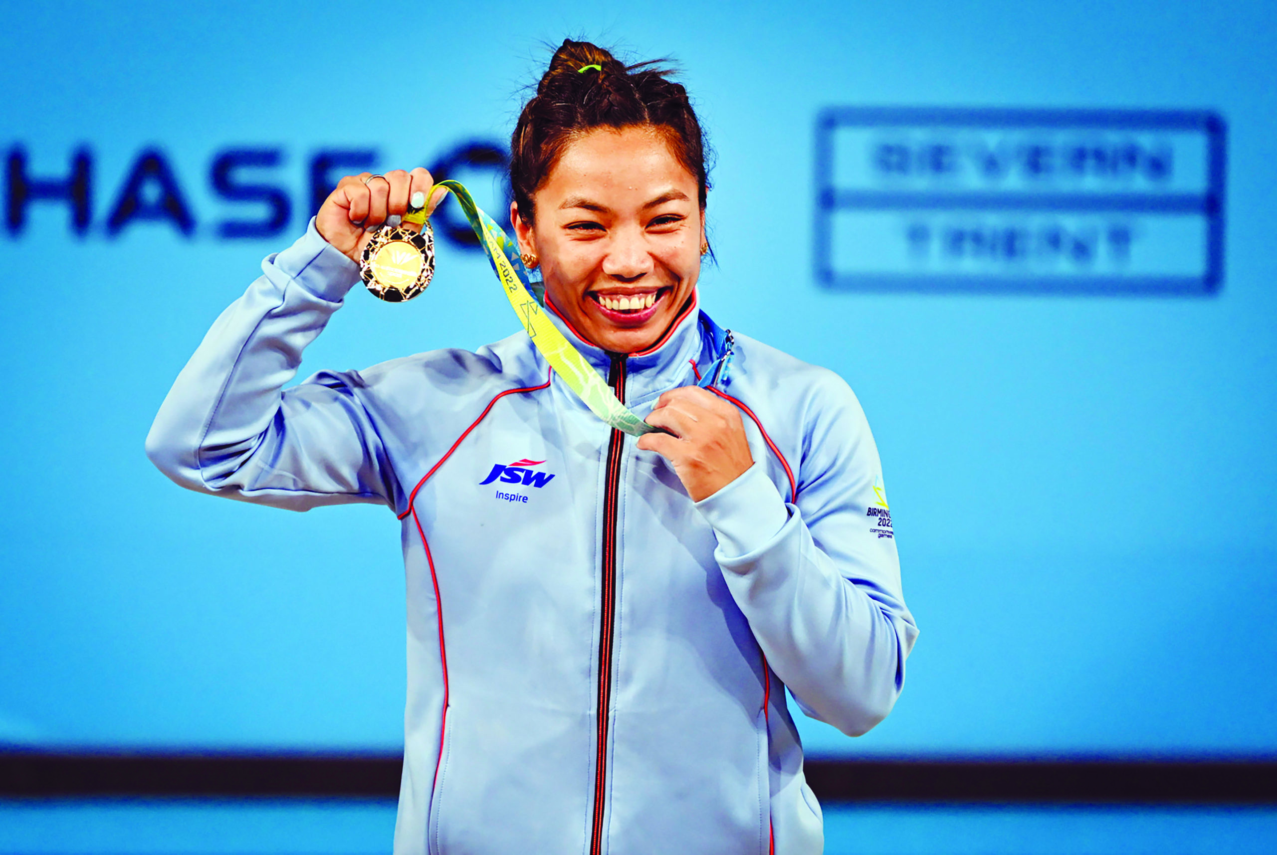 Mirabai Chanu with the gold medal after winning women’s 49kg