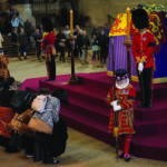 Public bow as they file past the coffin of Queen Elizabeth II