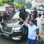Security personnel escort Imran Khan vehicle
