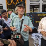 Roberto plays a tram conductor in Kolkata at Tram Yatra