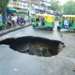 Road caves in after rain in Ahmedabad