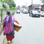 An old khasi lady vendor is selling pineapple on the street of Shillong on 31-0702023. Pix by UB PHOTOS