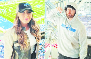 Eminem & Daughter Hailie Jade Make Rare Appearance at Lions Game