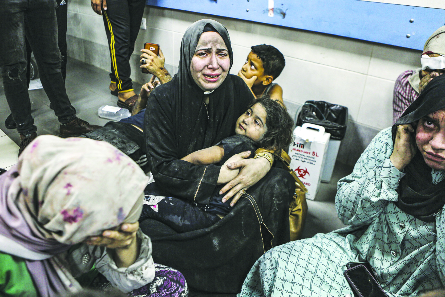 Wounded Palestinians Sit In Al-Shifa Hospital In Gaza City, Central ...