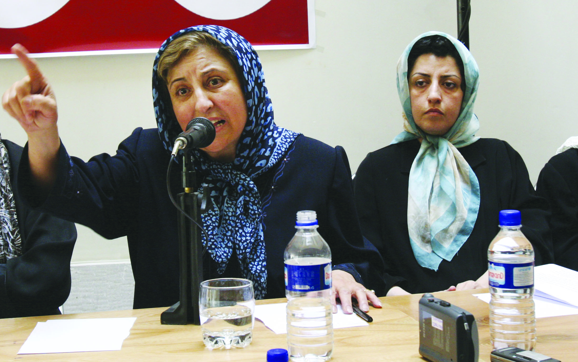 Prominent Iranian Human Rights Activist Narges Mohammadi (R) Listens To ...